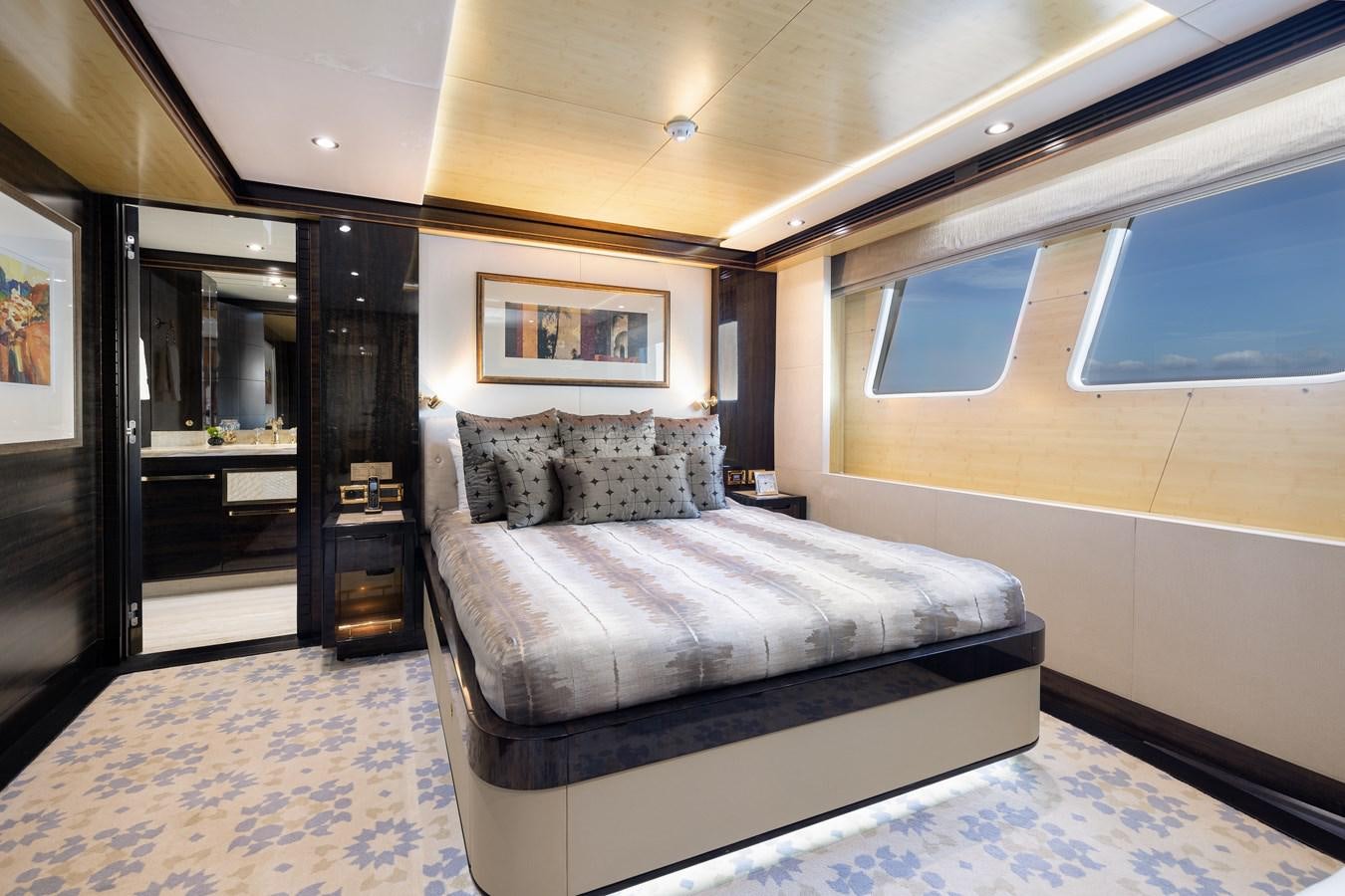 a bed in a room aboard LADY TAHITI Yacht for Sale