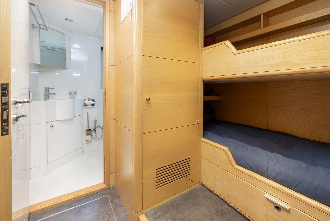 a room with wooden cabinets aboard LADY TAHITI Yacht for Sale