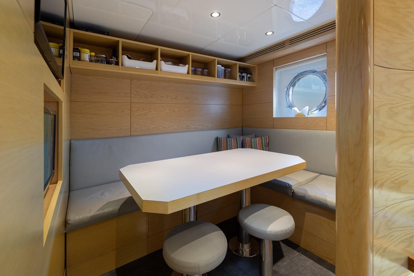 a room with a desk and a window aboard LADY TAHITI Yacht for Sale