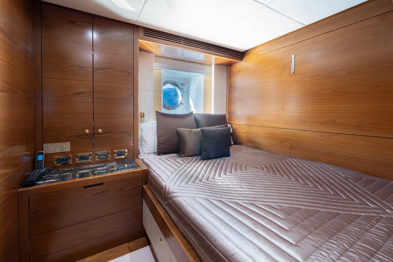 a bed in a cabin aboard LADY TAHITI Yacht for Sale