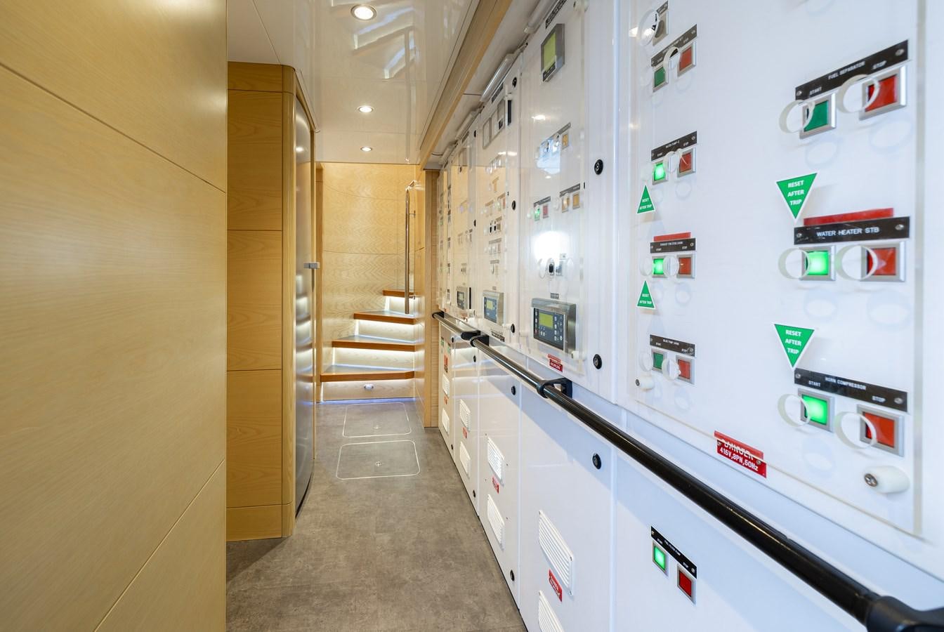 a hallway with white cabinets aboard LADY TAHITI Yacht for Sale