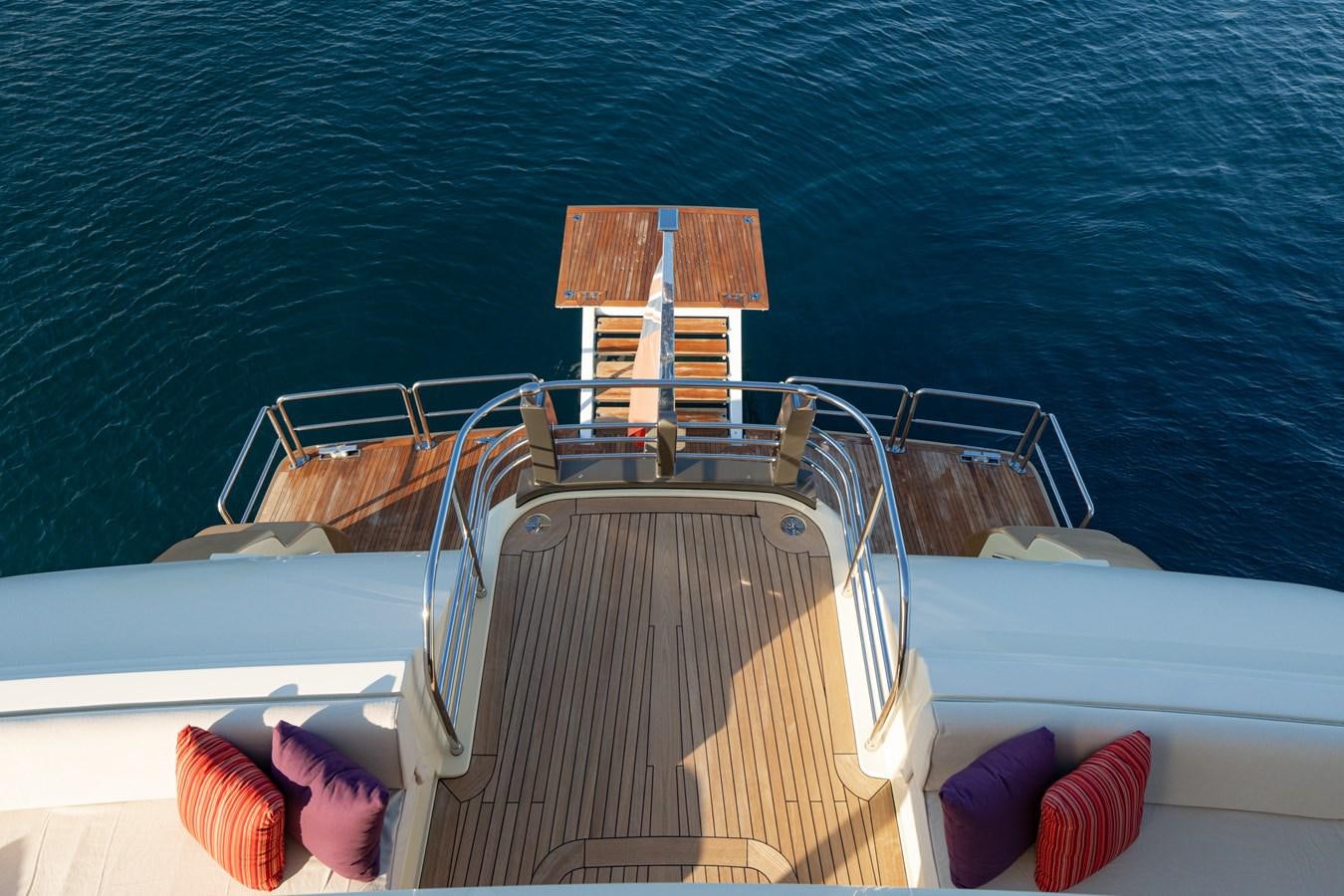 a boat with a striped seat aboard LADY TAHITI Yacht for Sale