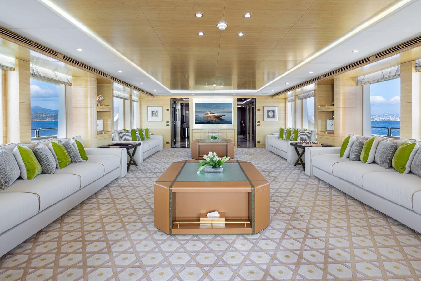a living room with a couch and a table aboard LADY TAHITI Yacht for Sale