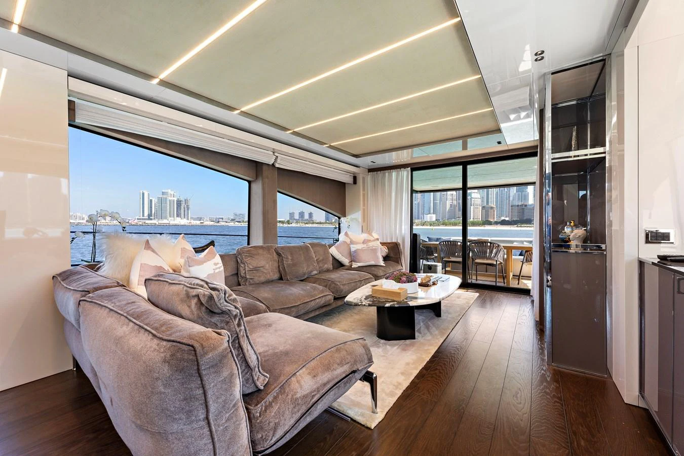 a living room with a large window aboard MOSHE Yacht for Sale