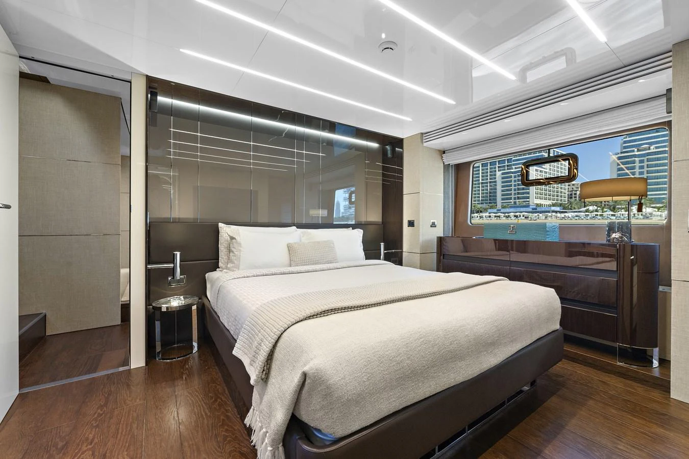 a room with a bed and a desk aboard MOSHE Yacht for Sale