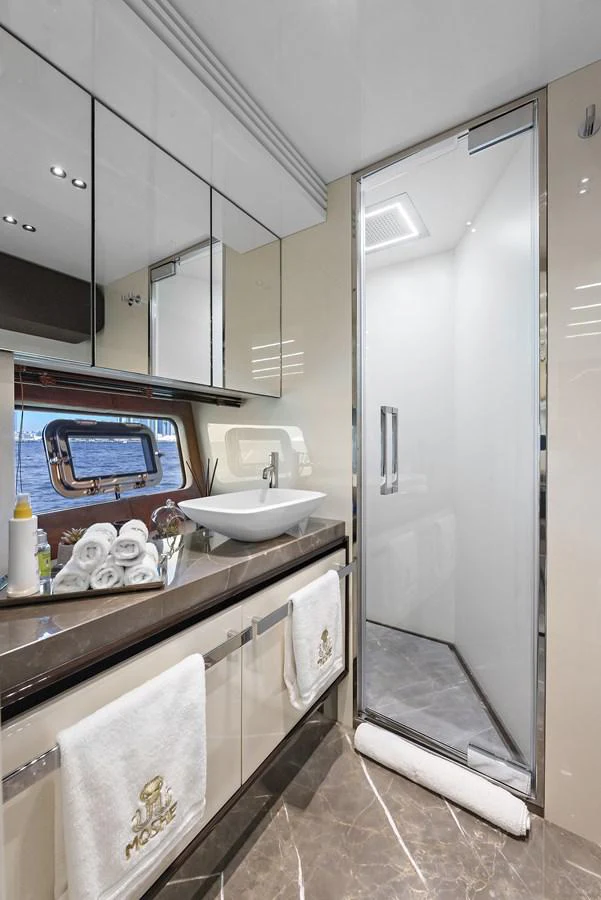 a bathroom with a sink and a mirror aboard MOSHE Yacht for Sale