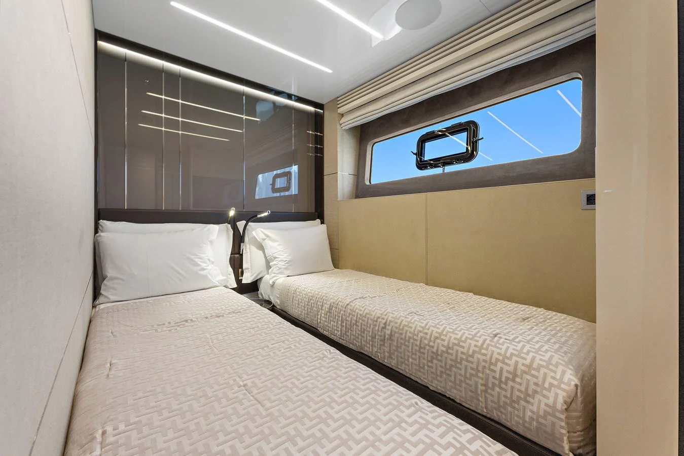 a couple of beds in a room aboard MOSHE Yacht for Sale