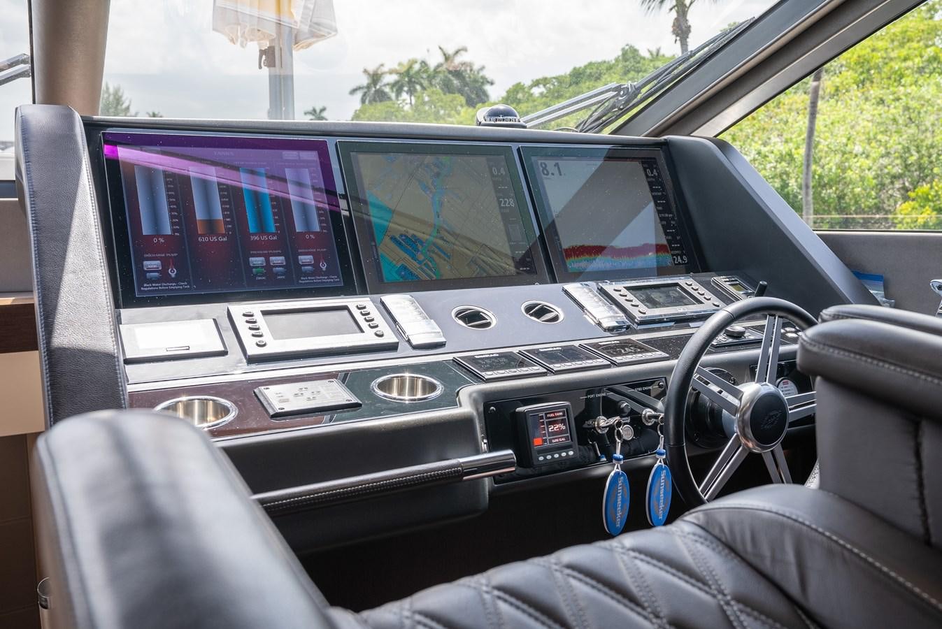 the inside of a car aboard F5 Yacht for Sale