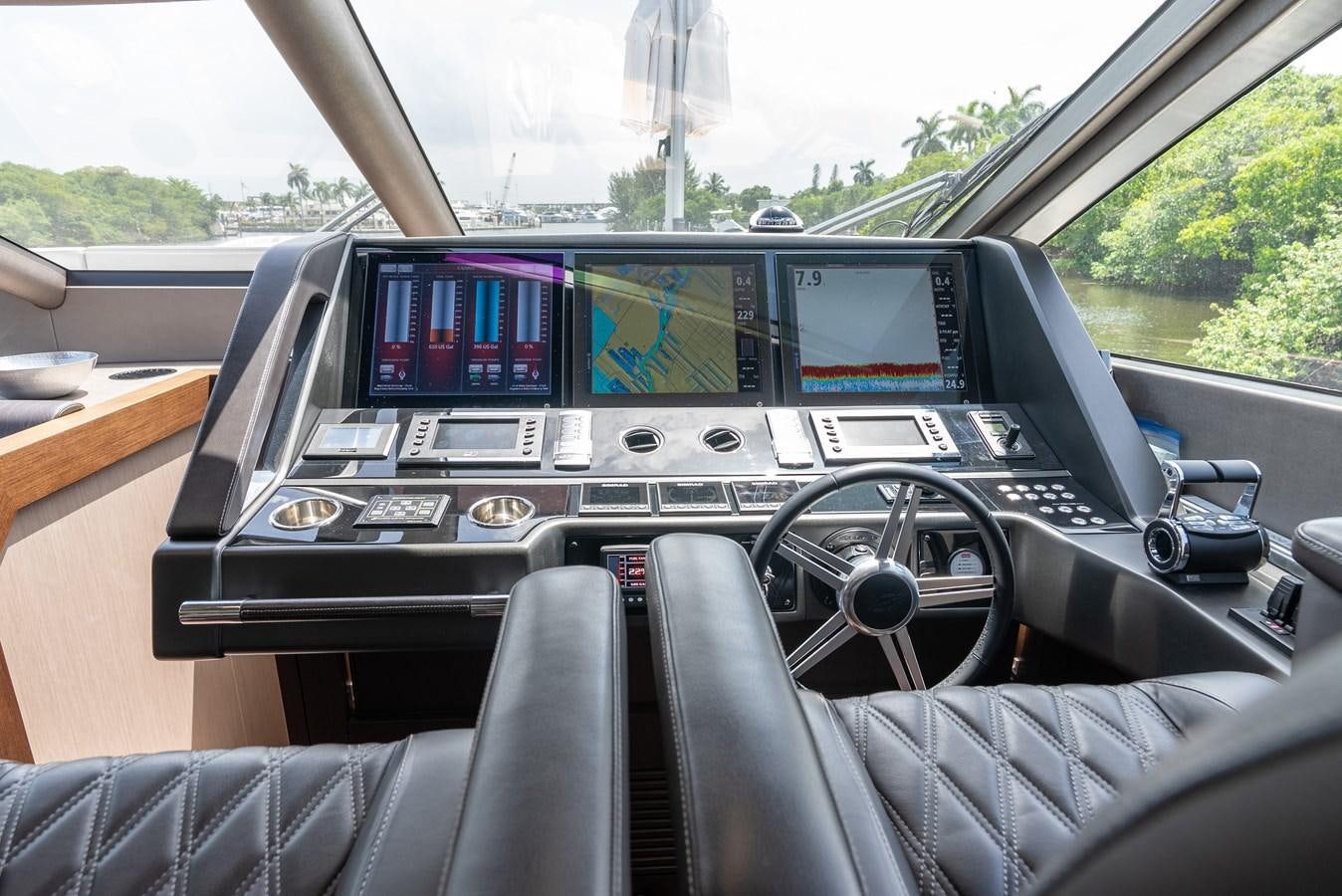 the inside of a car aboard F5 Yacht for Sale