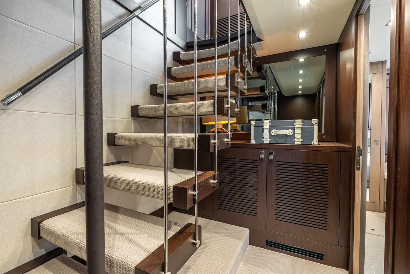 a metal staircase in a building aboard F5 Yacht for Sale