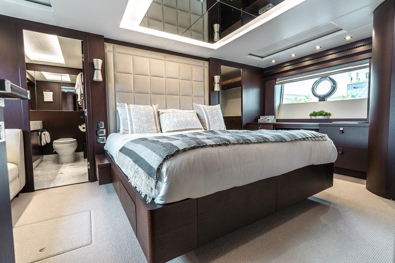a bed in a room aboard F5 Yacht for Sale