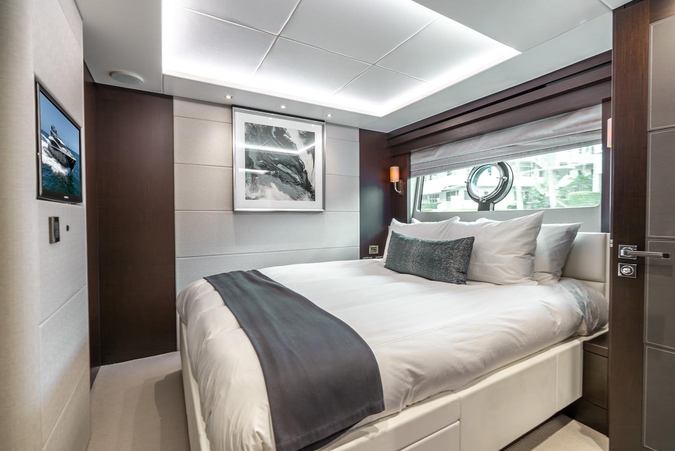a bed in a room aboard F5 Yacht for Sale