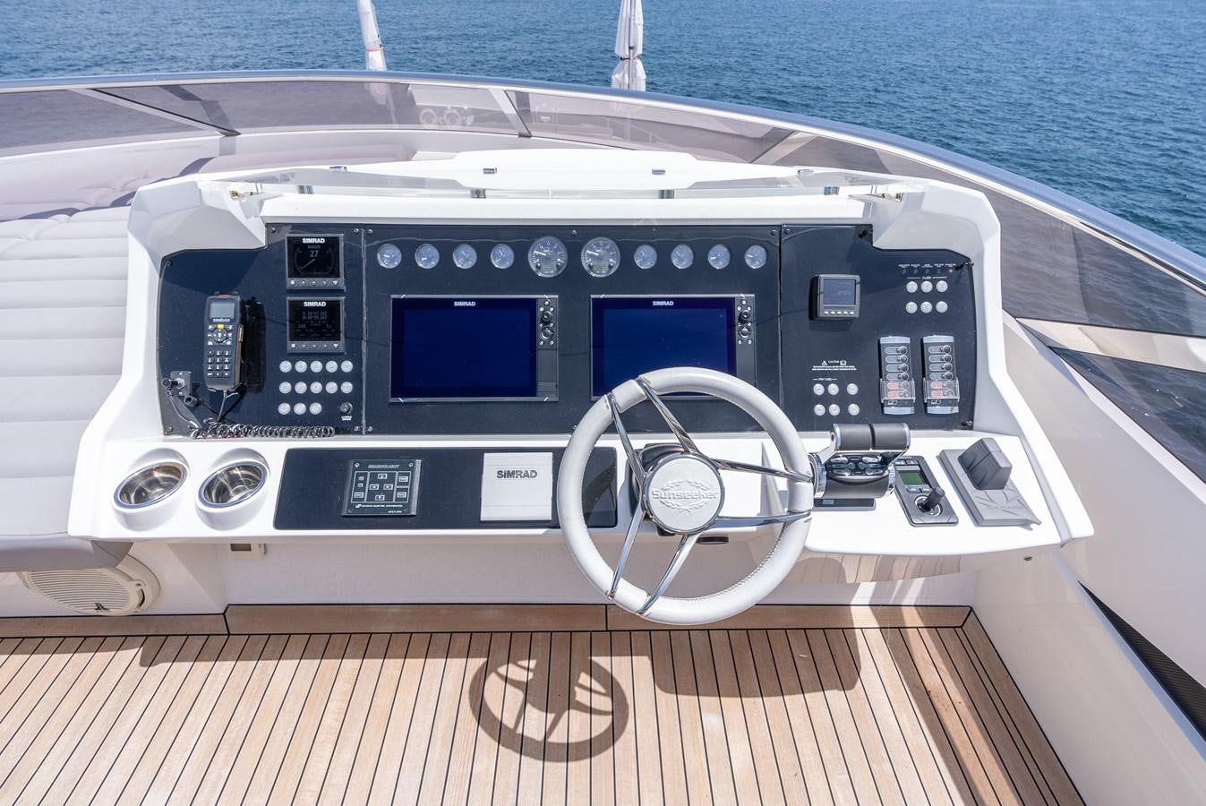the inside of a car aboard F5 Yacht for Sale
