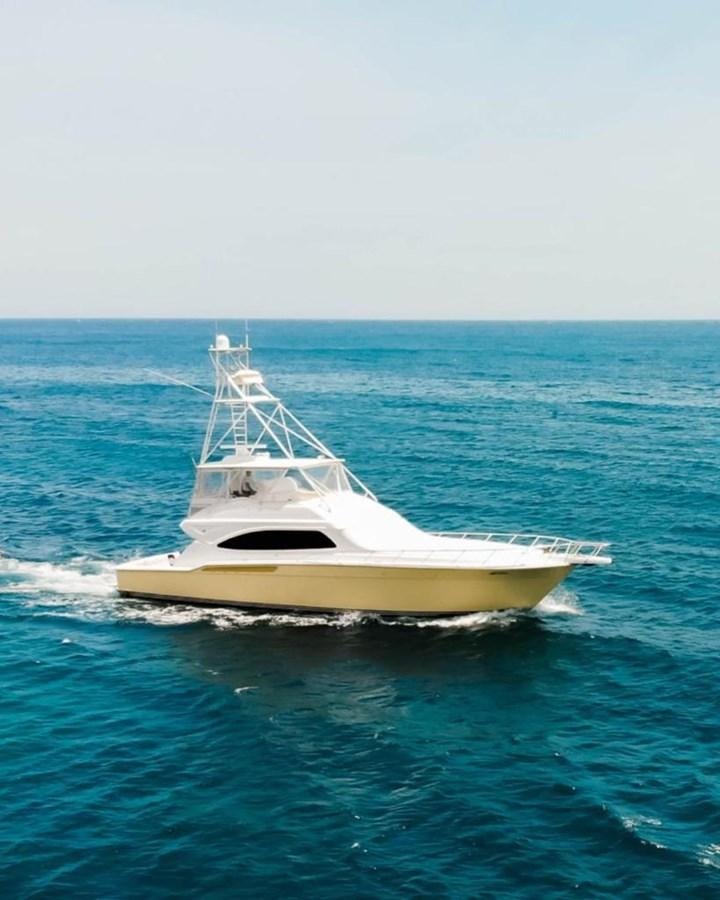 a boat in the water aboard BERTRAM 66 Yacht for Sale