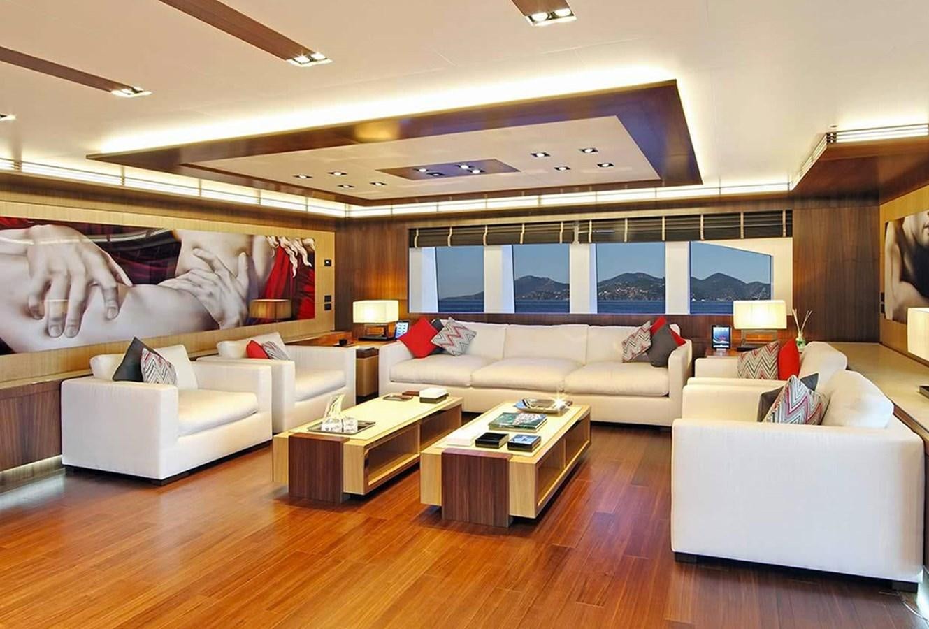 a living room with a large screen aboard ARMADA Yacht for Sale