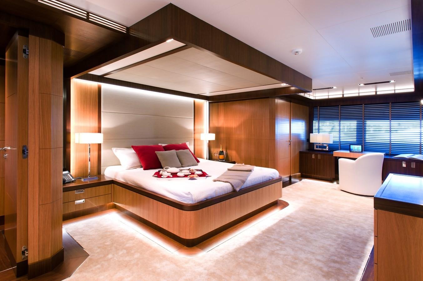 a large bedroom with a large bed aboard ARMADA Yacht for Sale