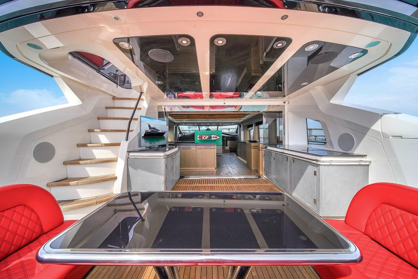 a staircase with a glass door aboard SUNSEEKER 115 SPORT YACHT  Yacht for Sale