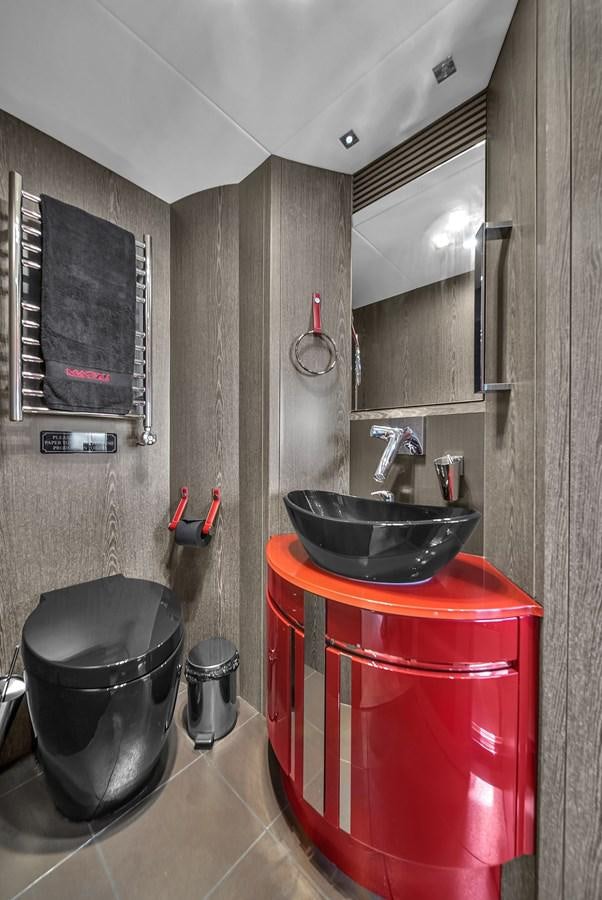a sink and bucket in a bathroom aboard SUNSEEKER 115 SPORT YACHT  Yacht for Sale