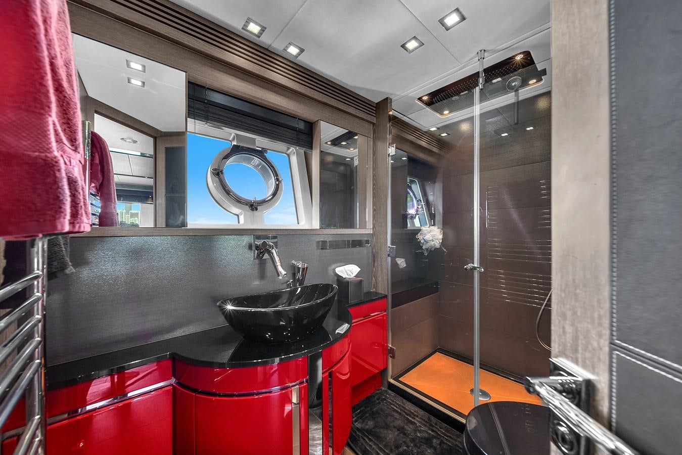 a kitchen with a sink and a large mirror aboard SUNSEEKER 115 SPORT YACHT  Yacht for Sale