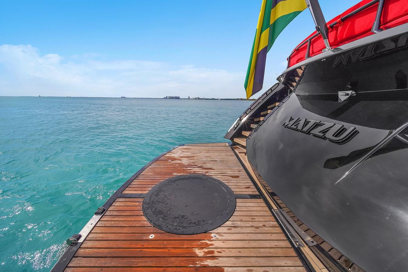 a boat on the water aboard SUNSEEKER 115 SPORT YACHT  Yacht for Sale