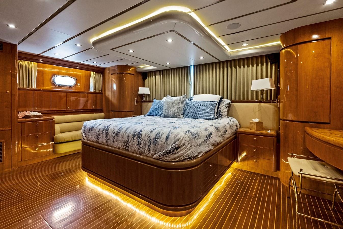 a large bedroom with a large bed aboard TORTUGA Yacht for Sale