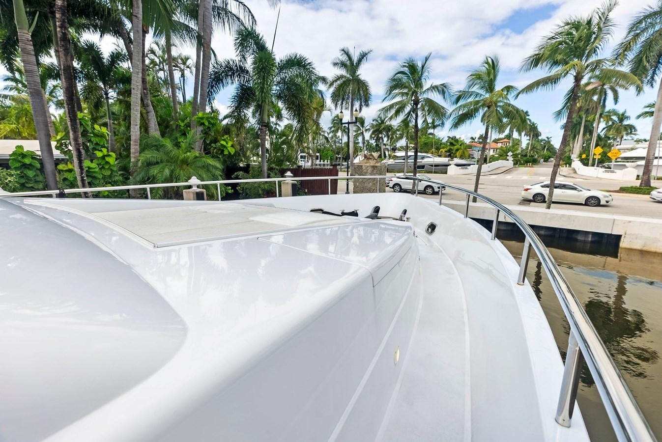 a swimming pool with a car parked on the side aboard TORTUGA Yacht for Sale