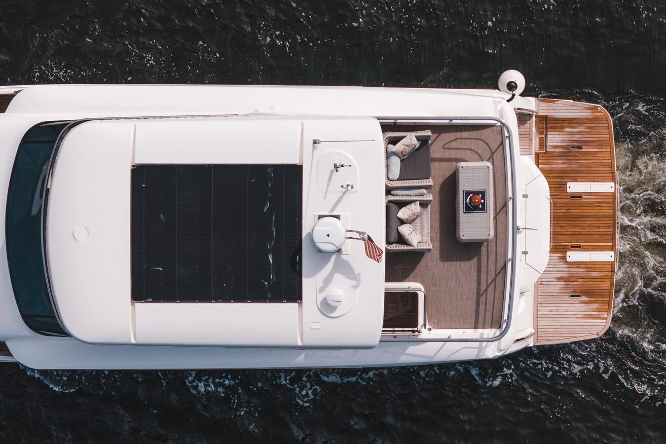 a white vehicle with a door and windows aboard ABSOLUTE 68 NAVETTA Yacht for Sale