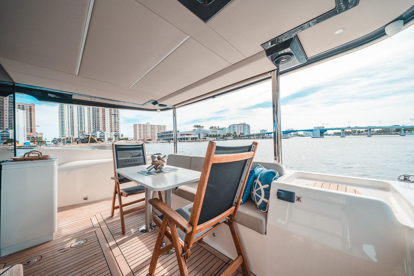 a table and chairs on a boat aboard ABSOLUTE 68 NAVETTA Yacht for Sale