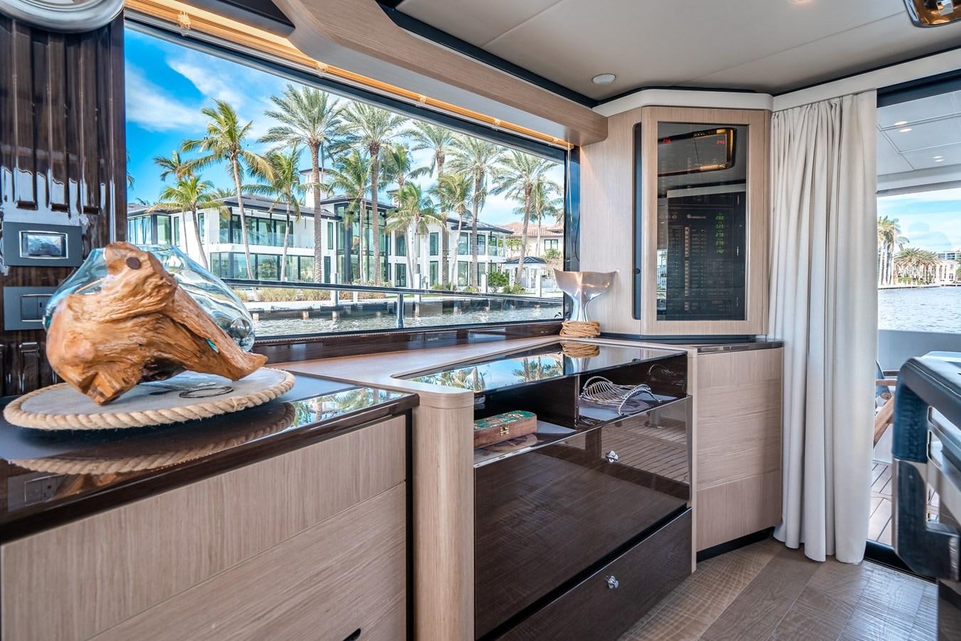 a statue of a turtle on a table in a living room aboard ABSOLUTE 68 NAVETTA Yacht for Sale