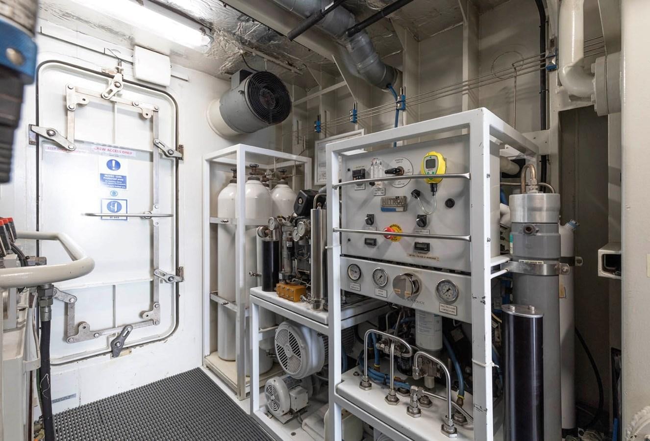 a machine in a room aboard SHADOW Yacht for Sale