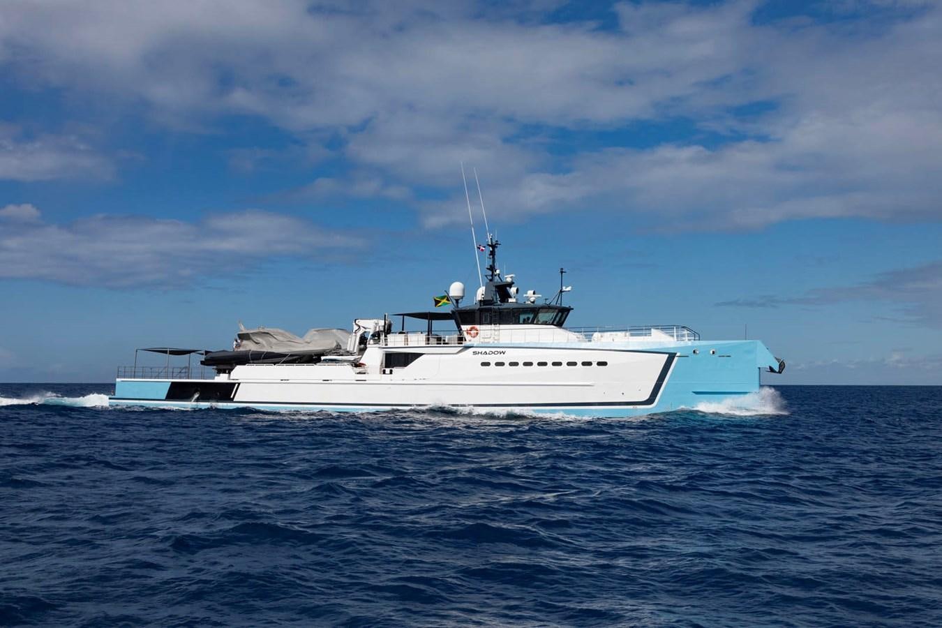 a white boat in the water aboard SHADOW Yacht for Sale