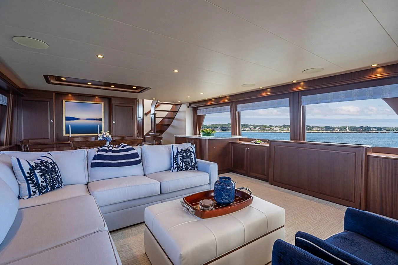 a living room with a couch and a table aboard TRANQUILITY Yacht for Sale
