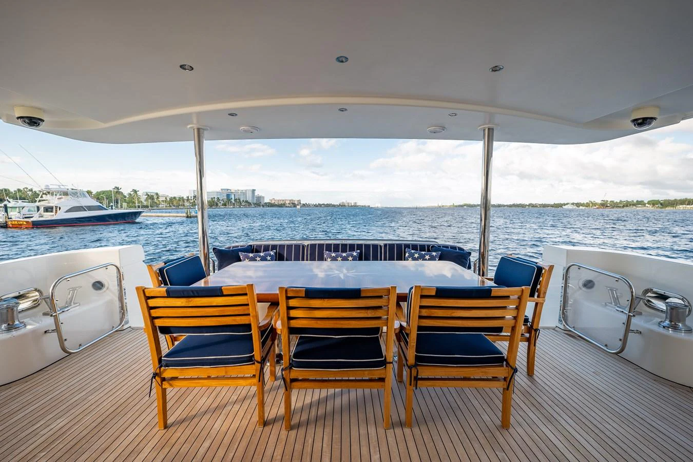 a table and chairs on a deck aboard TRANQUILITY Yacht for Sale