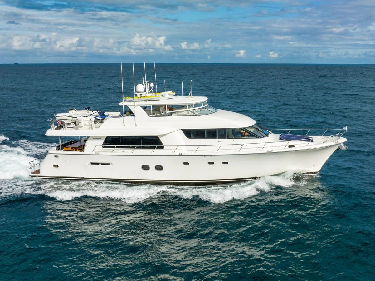 a white yacht in the water aboard TRANQUILITY Yacht for Sale