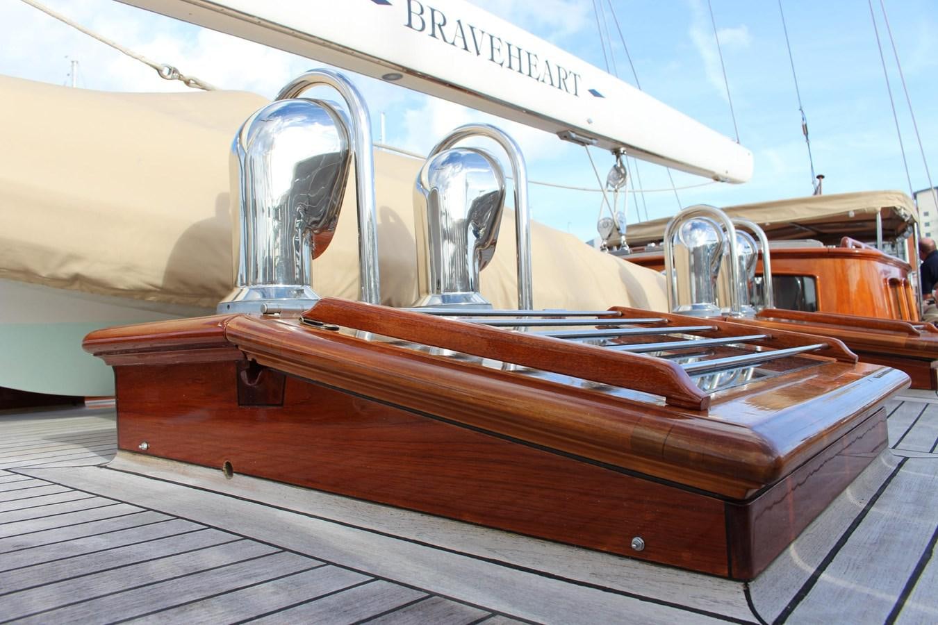 a wooden boat on a deck aboard BRAVEHEART OF SARK Yacht for Sale