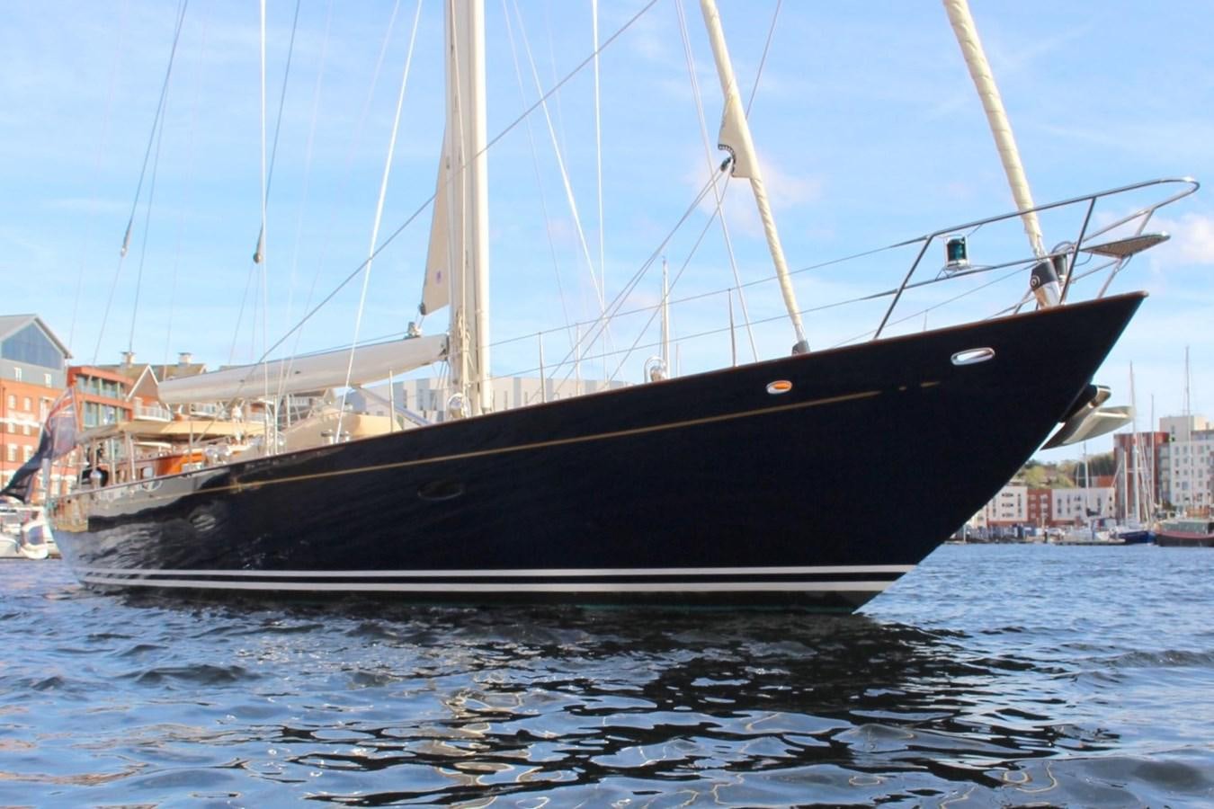 a black boat on the water aboard BRAVEHEART OF SARK Yacht for Sale