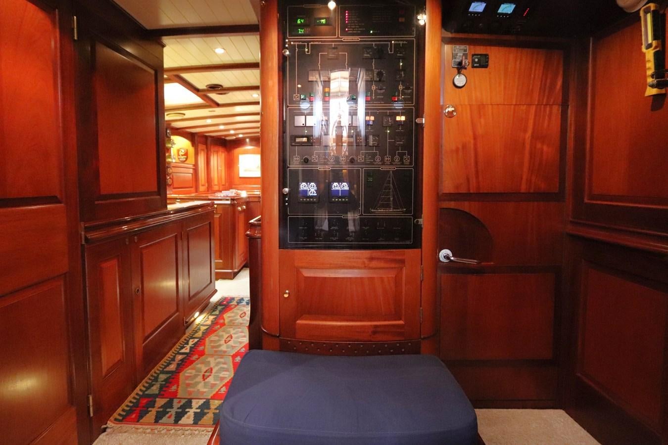 a room with wooden cabinets aboard BRAVEHEART OF SARK Yacht for Sale