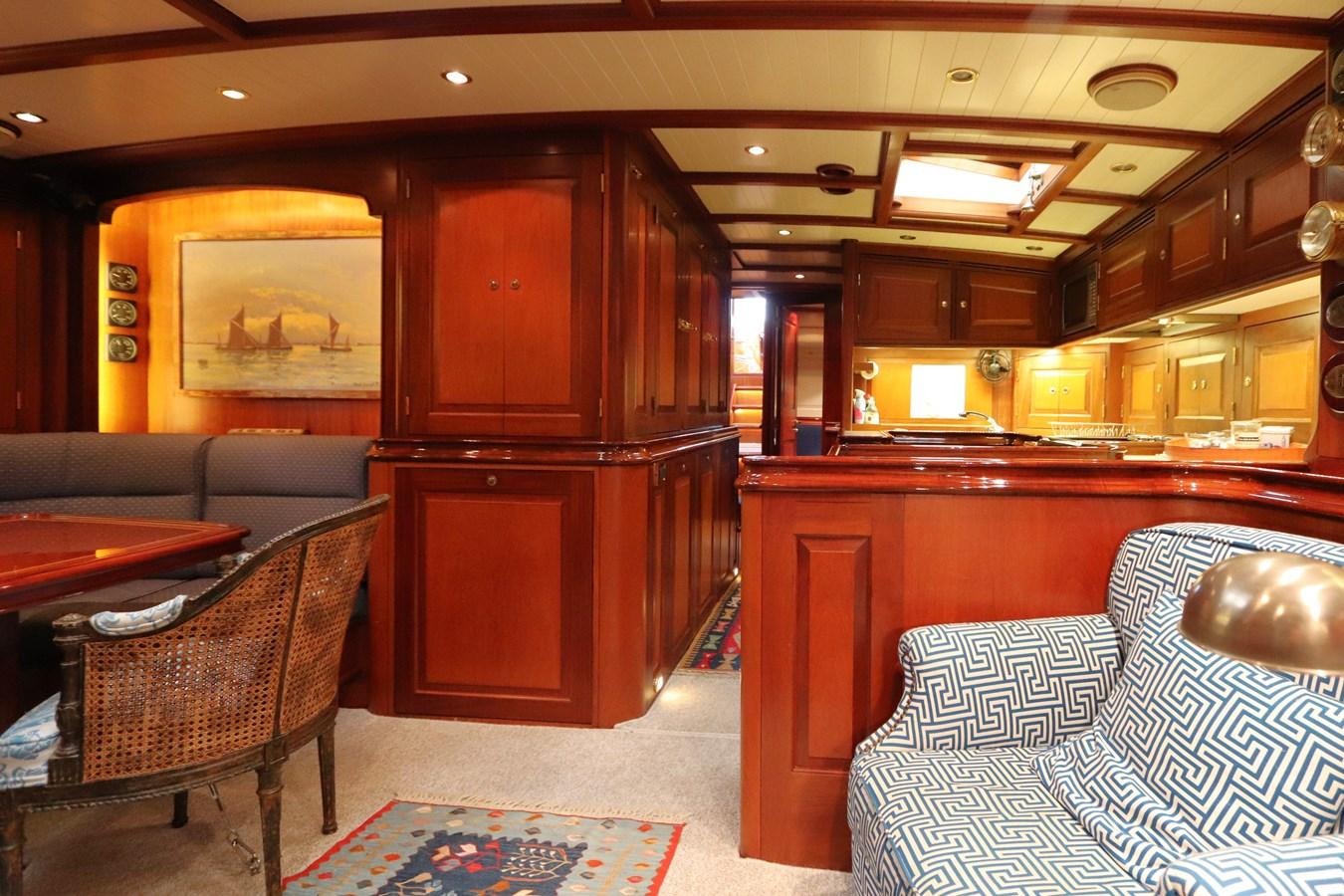 a room with a couch and chairs aboard BRAVEHEART OF SARK Yacht for Sale