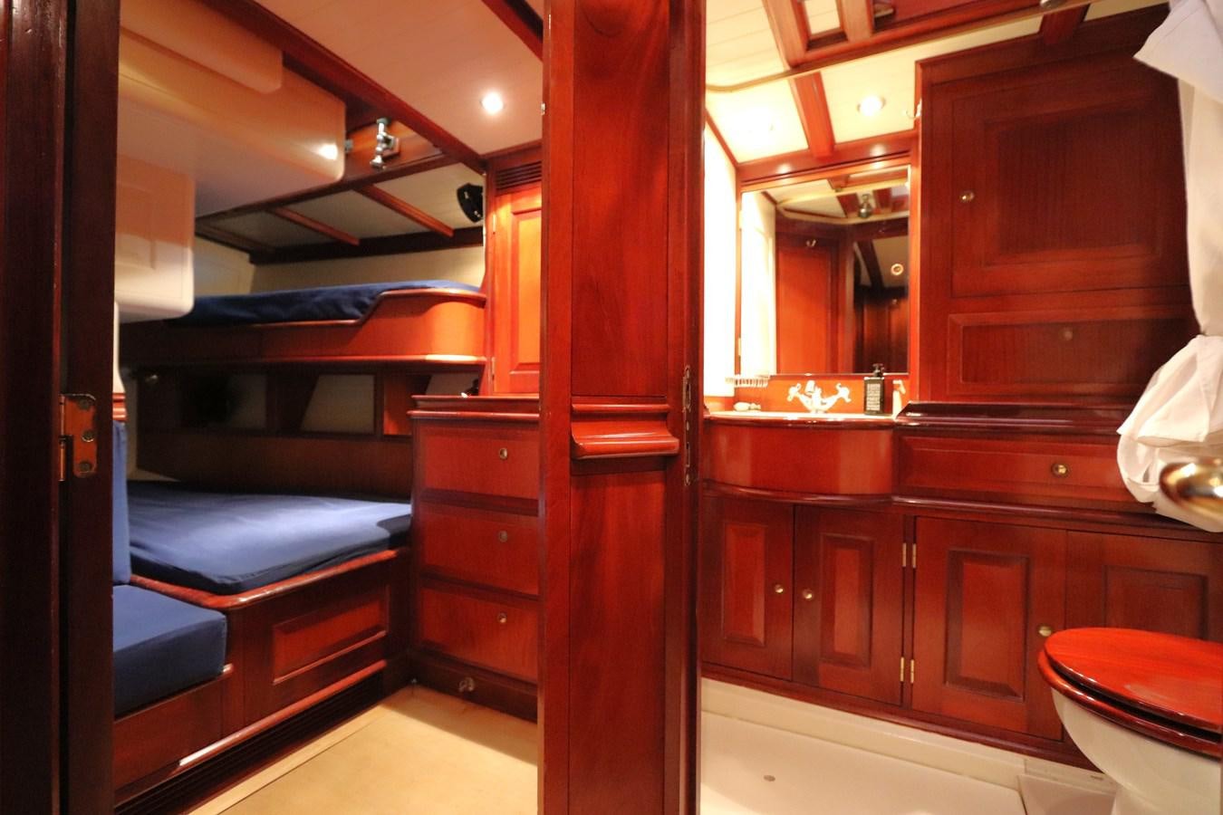 a room with wooden cabinets aboard BRAVEHEART OF SARK Yacht for Sale
