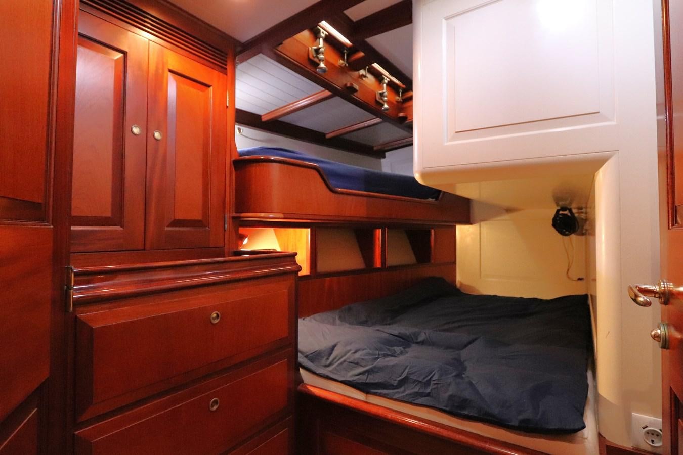 a bed in a room aboard BRAVEHEART OF SARK Yacht for Sale