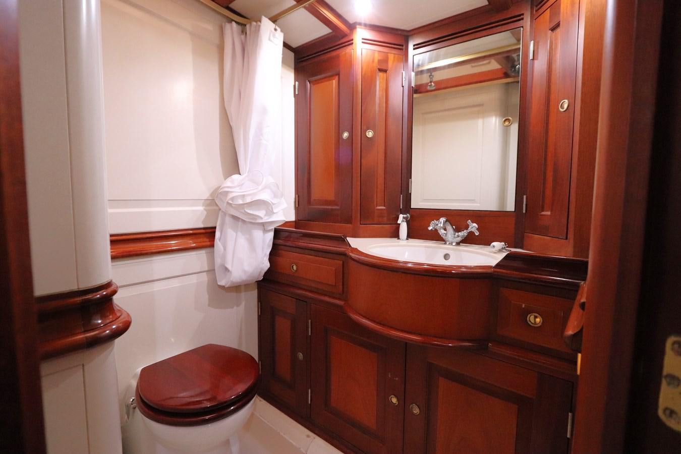 a bathroom with a sink and toilet aboard BRAVEHEART OF SARK Yacht for Sale