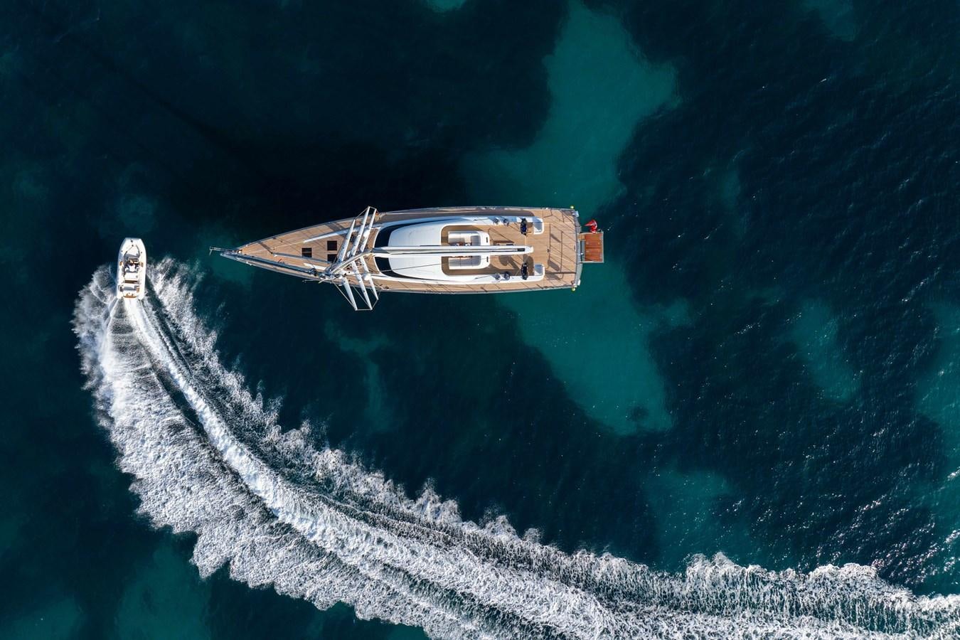 a satellite above the earth aboard MINI Y Yacht for Sale