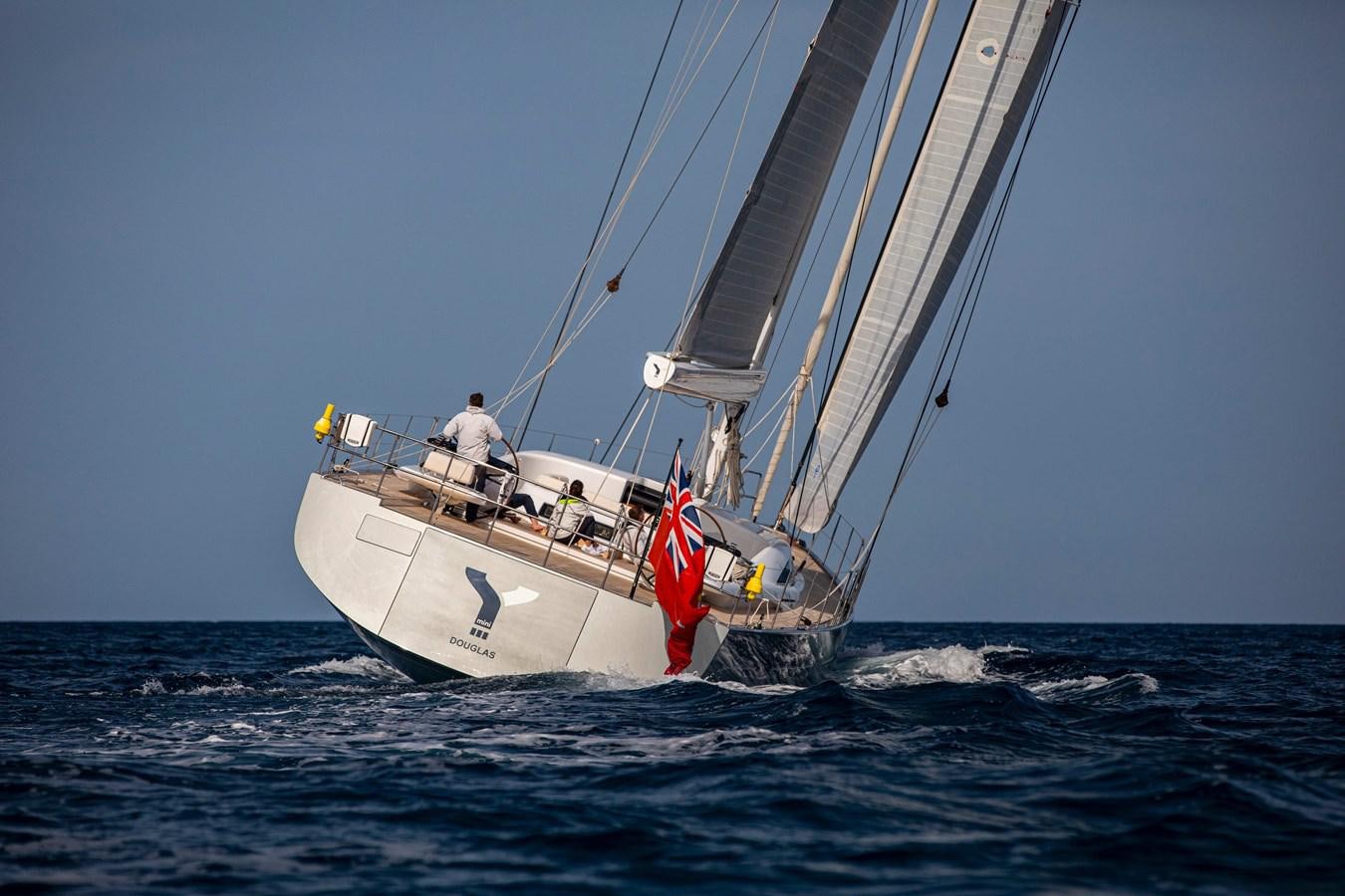 a boat sailing in the sea aboard MINI Y Yacht for Sale