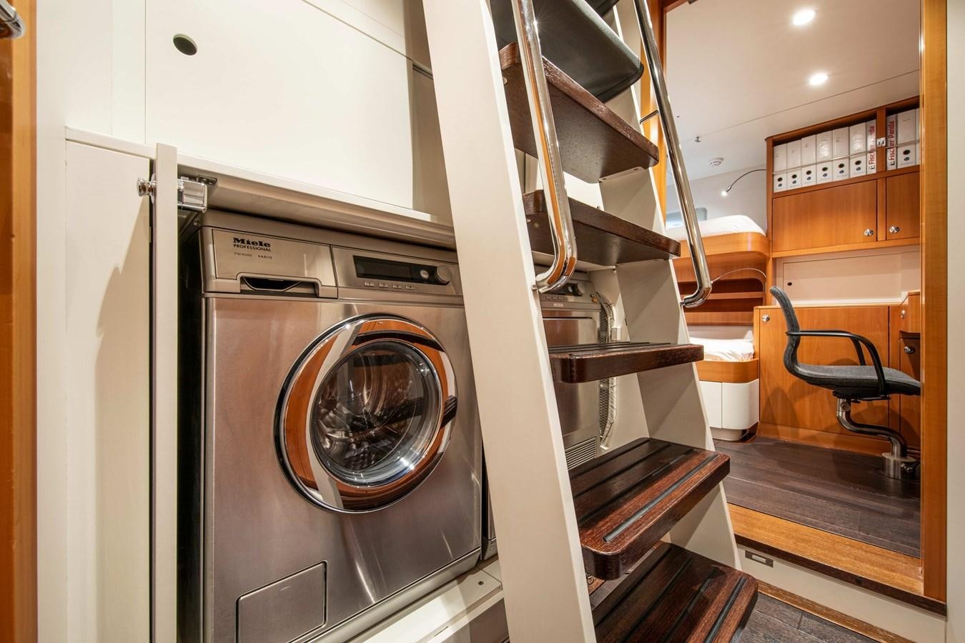 a kitchen with a large silver oven aboard MINI Y Yacht for Sale