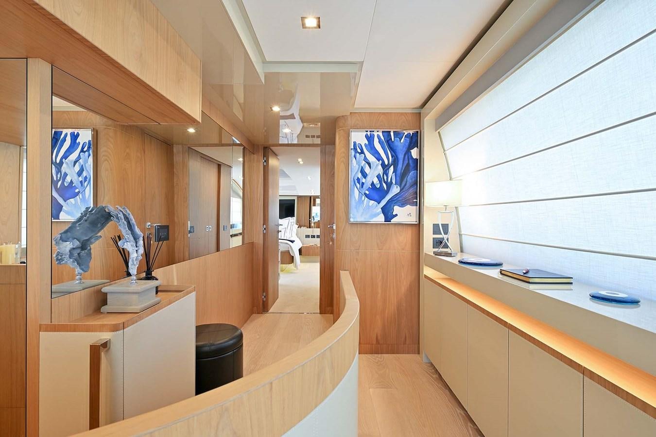 a room with a desk and a chair aboard HULL 21 Yacht for Sale