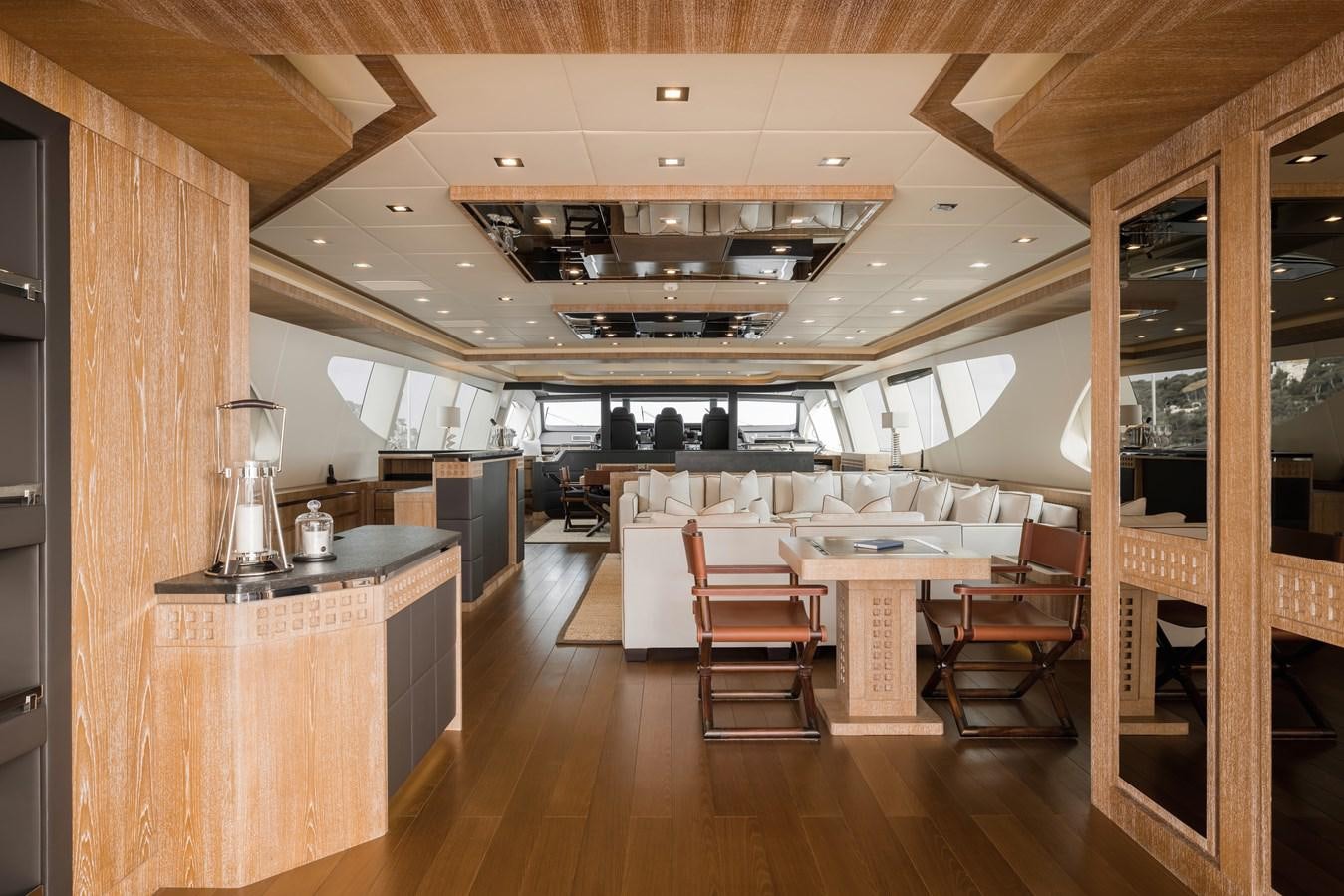 a kitchen with a wood floor aboard ROYALE X Yacht for Sale