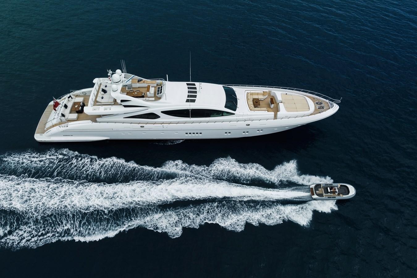 a white boat on the water aboard ROYALE X Yacht for Sale