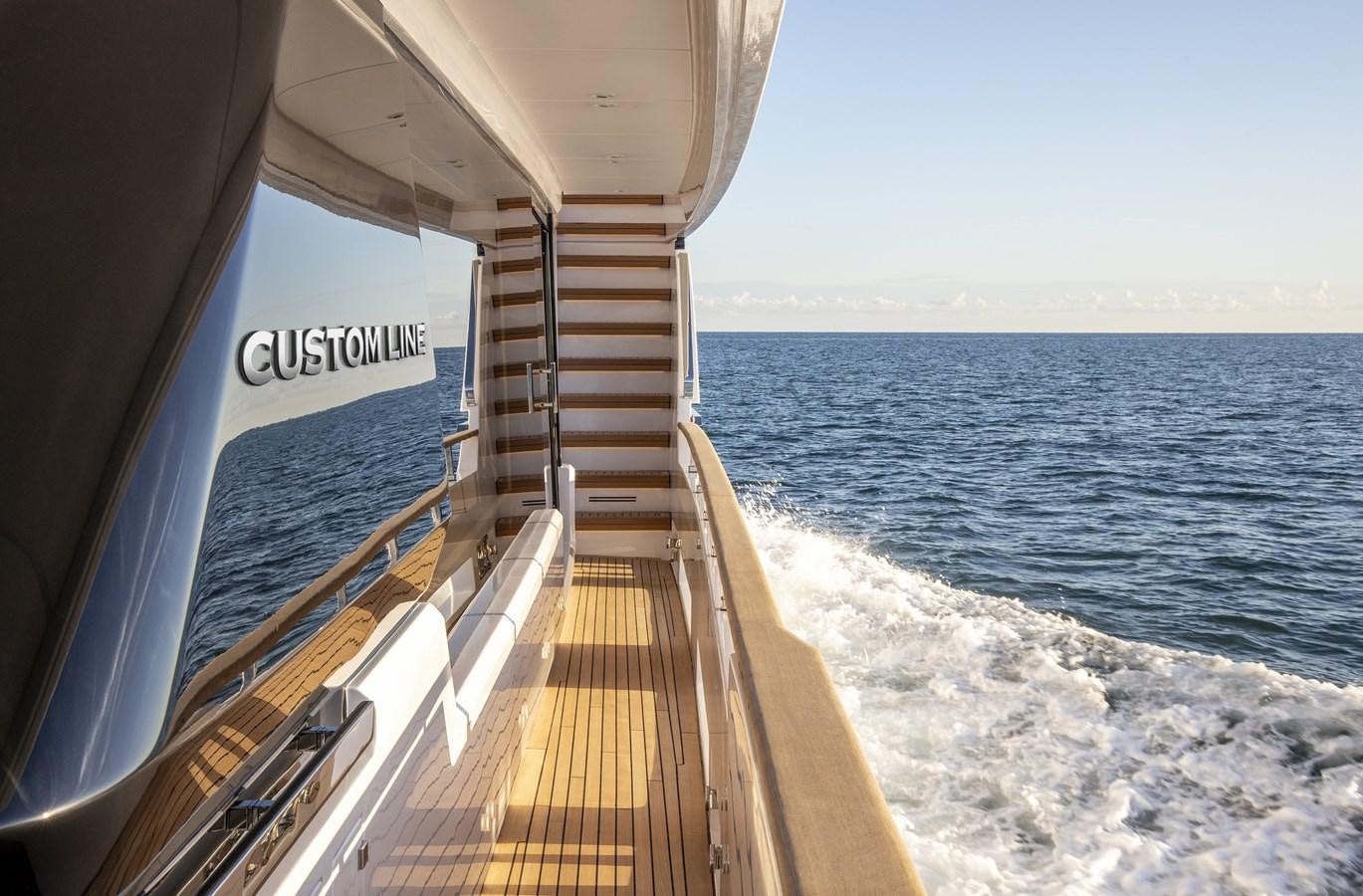 a boat on the water aboard CUSTOM LINE NAVETTA 33/33 Yacht for Sale