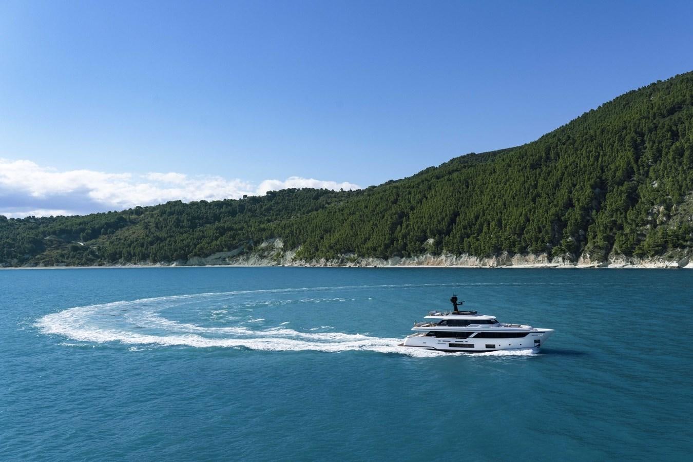 a boat on the water aboard CUSTOM LINE NAVETTA 33/33 Yacht for Sale