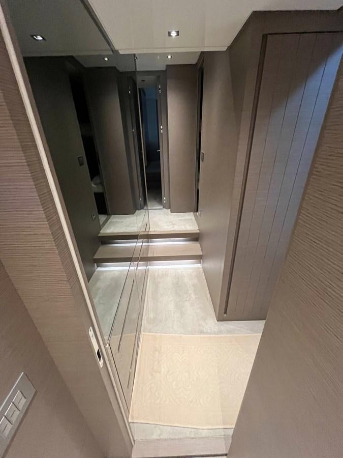 a hallway with doors aboard 2021 SANLORENZO SL78 #721 Yacht for Sale